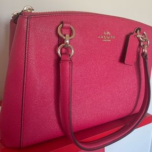 Brand new not with tag Coach purse, dark pink, comes with shoulder straps